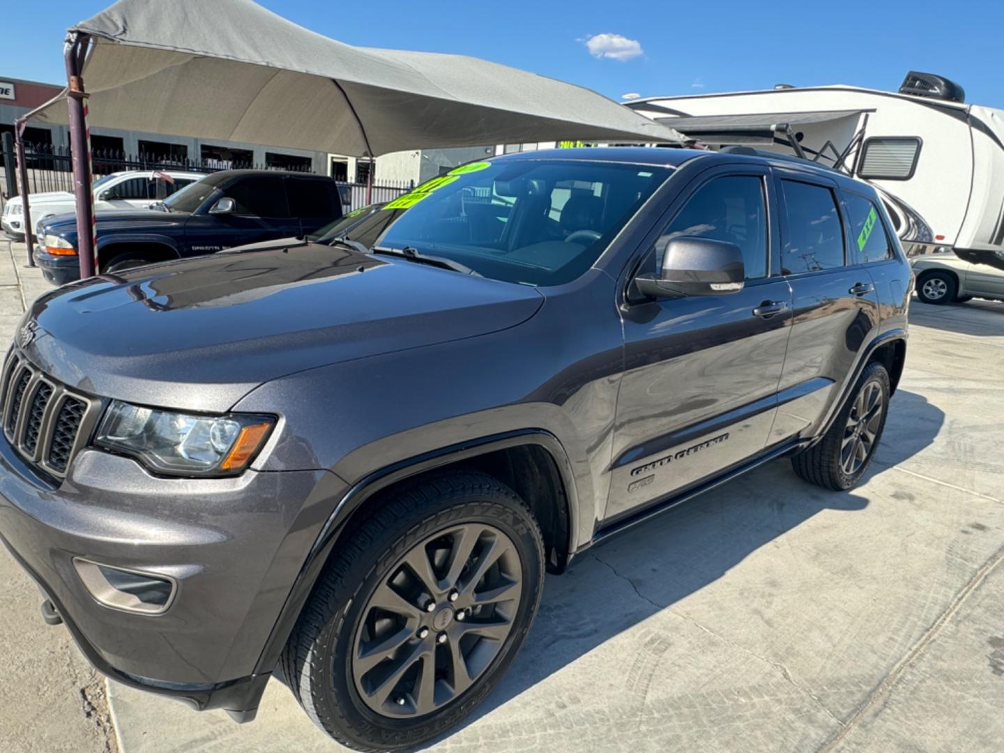 2016 grey Jeep Grand Cherokee (1C4RJFBG0GC) , located at 2190 Hwy 95, Bullhead City, AZ, 86442, (928) 704-0060, 0.000000, 0.000000 - 75th anniversary edition. clean carfax. jeep grand cherokee limited 4 wd. Leather loaded. 81k miles. free and clear title. - Photo#16